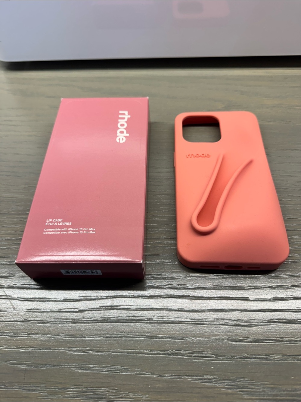 Two RHODE (1 Coral Pink & 1 Salty Tan NIB) Lip Strap iPhone Cases 15 ProMax